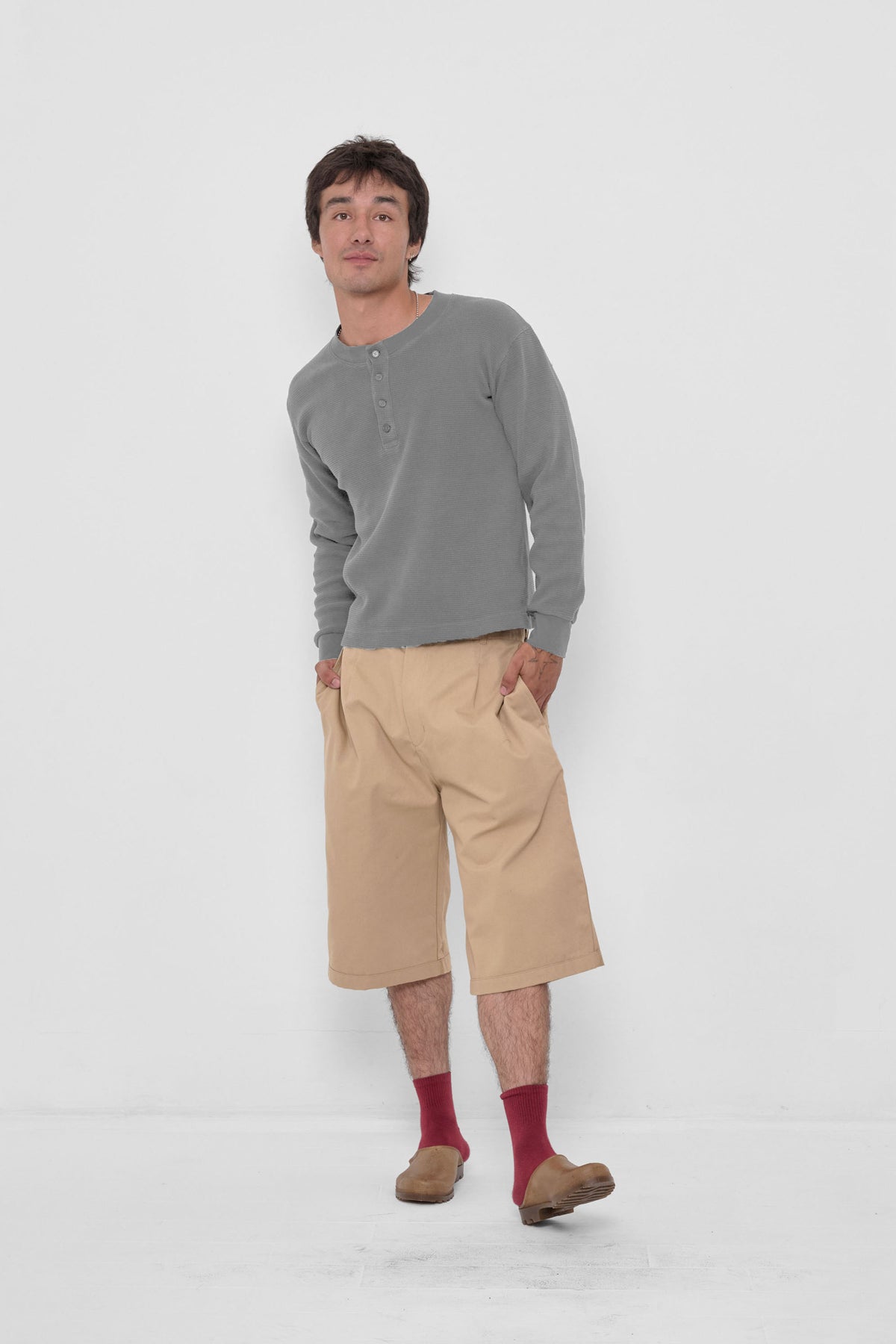 Thermal Henley Trash Tee in Stone – styled with Sand Storm Bermuda Shorts, Garnet Spring Socks and Plasticana Opana Mules