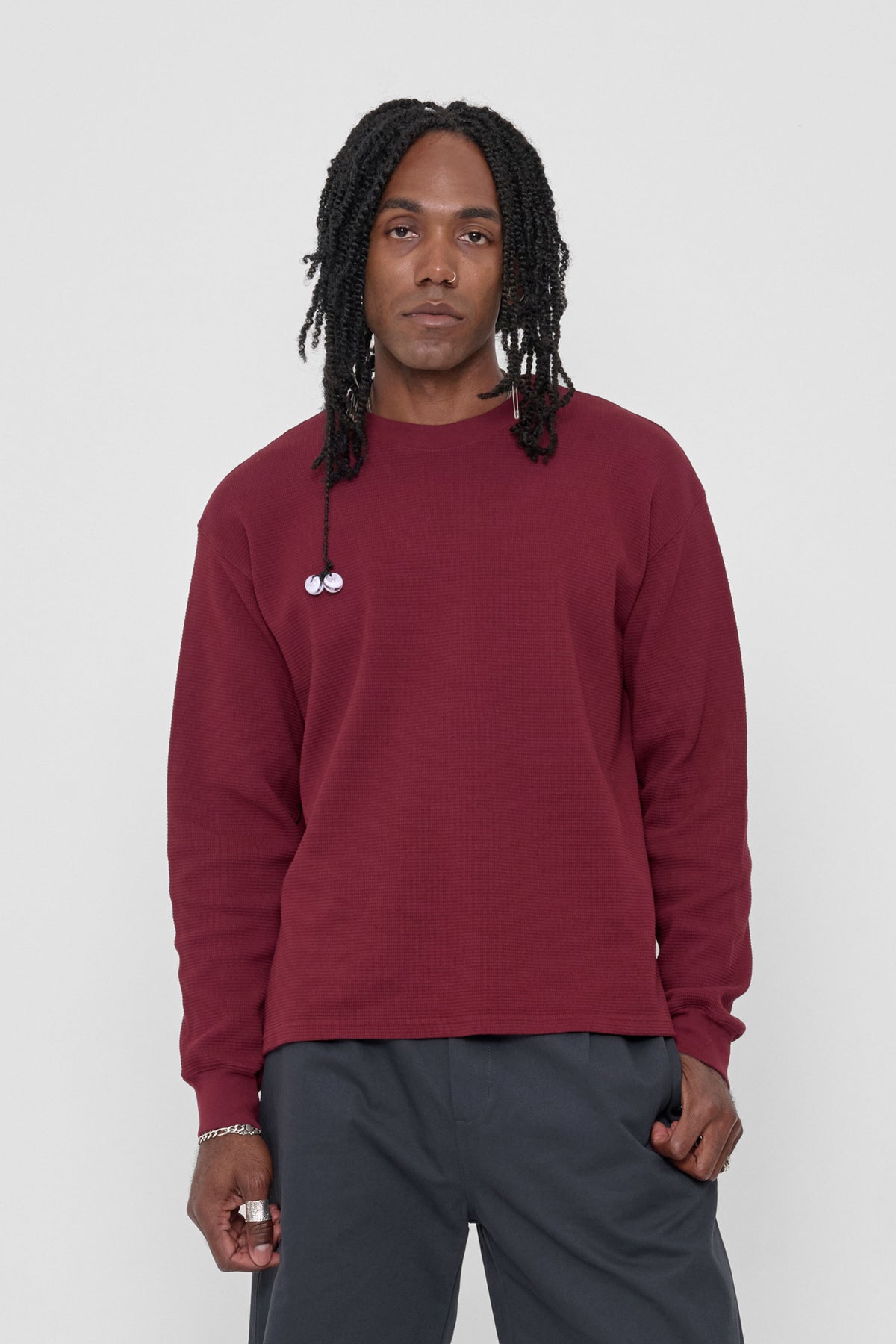 Thermal Trash Tee in Garnet – front view on model