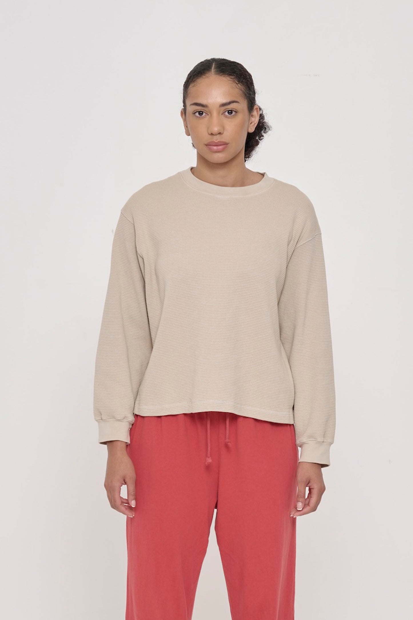 A 5'8" woman in an Oat Thermal Long Sleeve Boxier Trash Tee, size S. Bottom hem hits her upper-middle hip.
