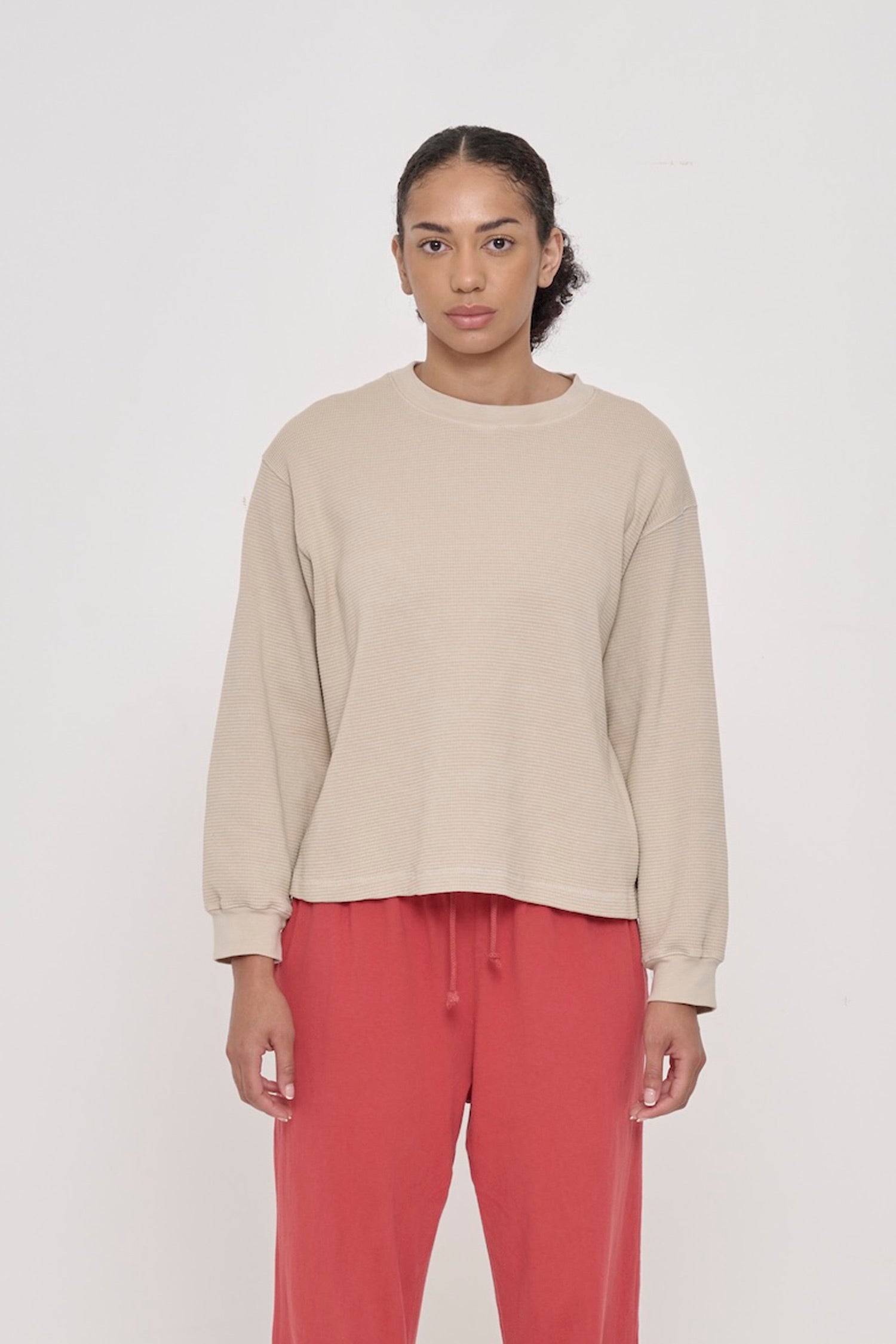 A 5'8" woman in an Oat Thermal Long Sleeve Boxier Trash Tee, size S. Bottom hem hits her upper-middle hip.