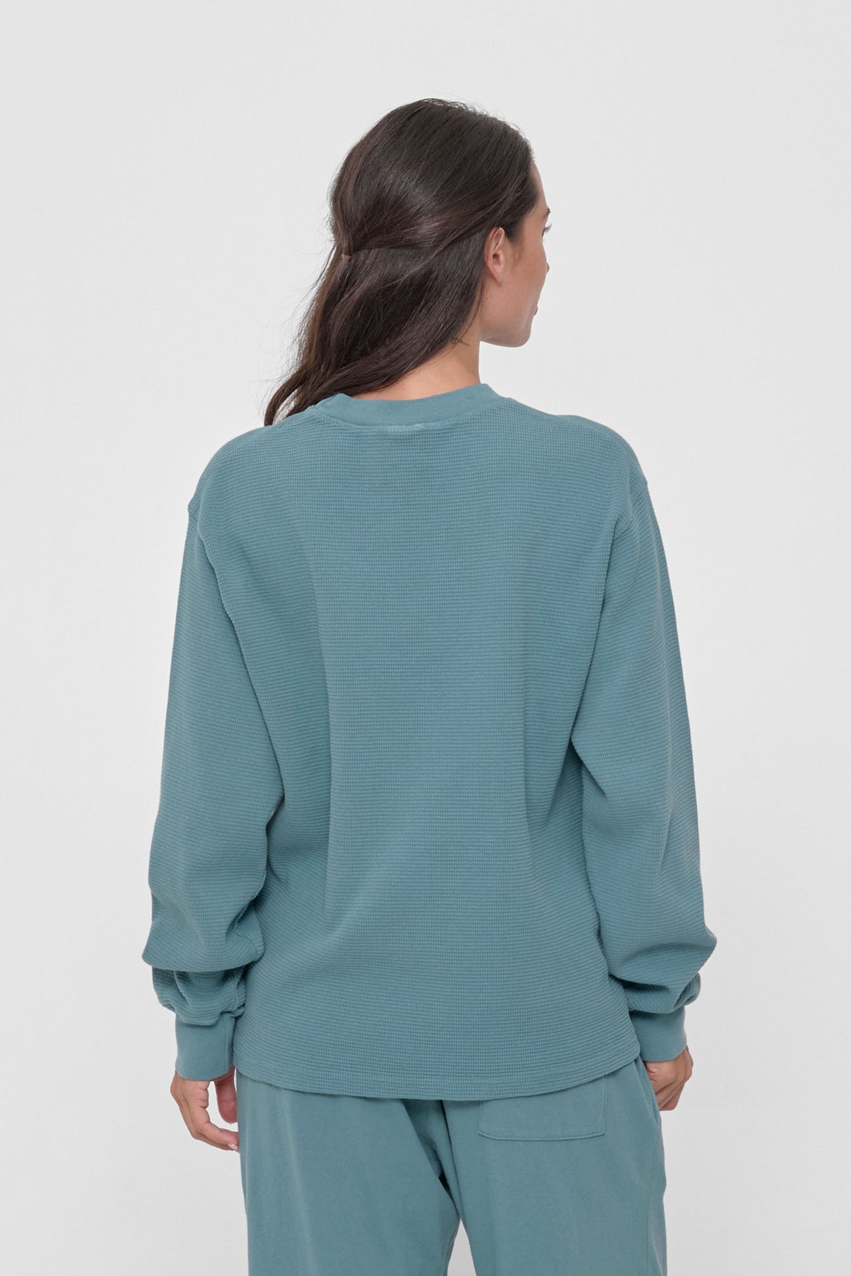 Thermal Trash Tee in Oyster – back view on model