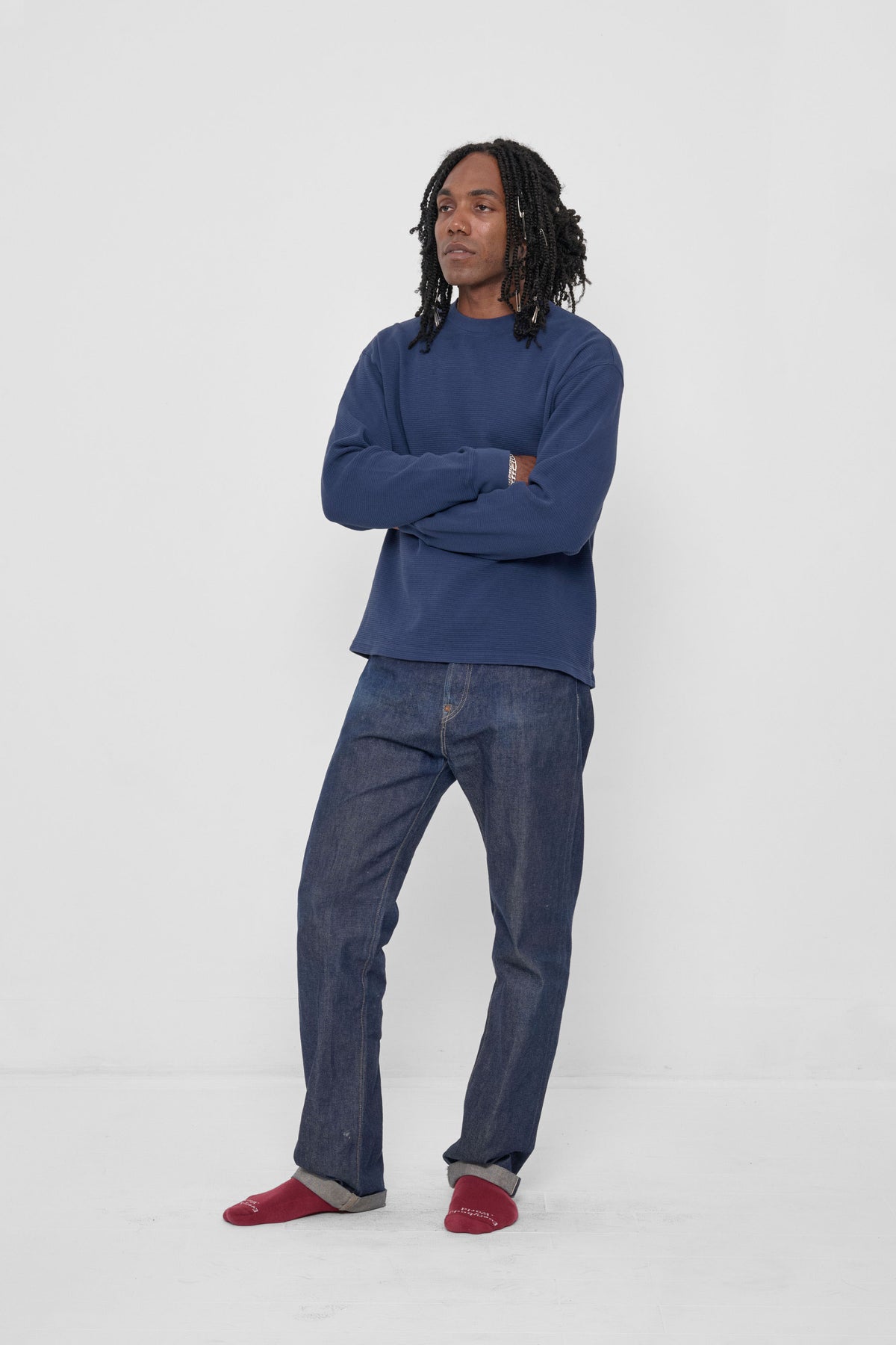 Thermal Trash Tee in Washed Navy – 3/4 front view on model, styled with Dark Wash Denim Jeans