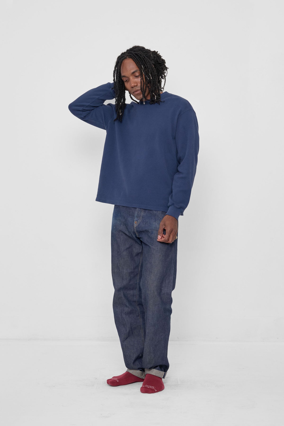 Thermal Trash Tee in Washed Navy – back view on model