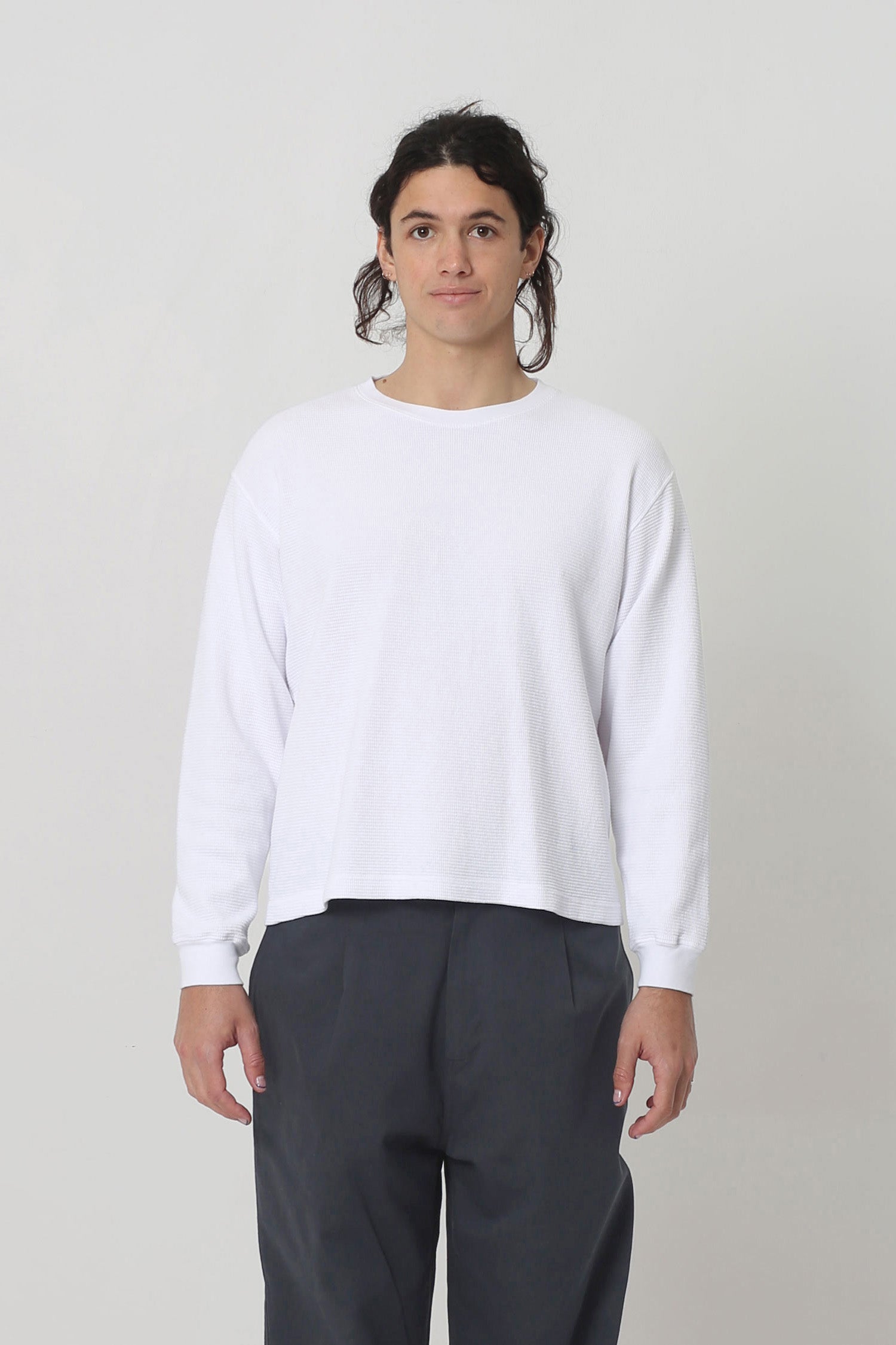 6' person in a size M White Thermal Long Sleeve Boxier Trash Tee. Hem hits the upper hip. 