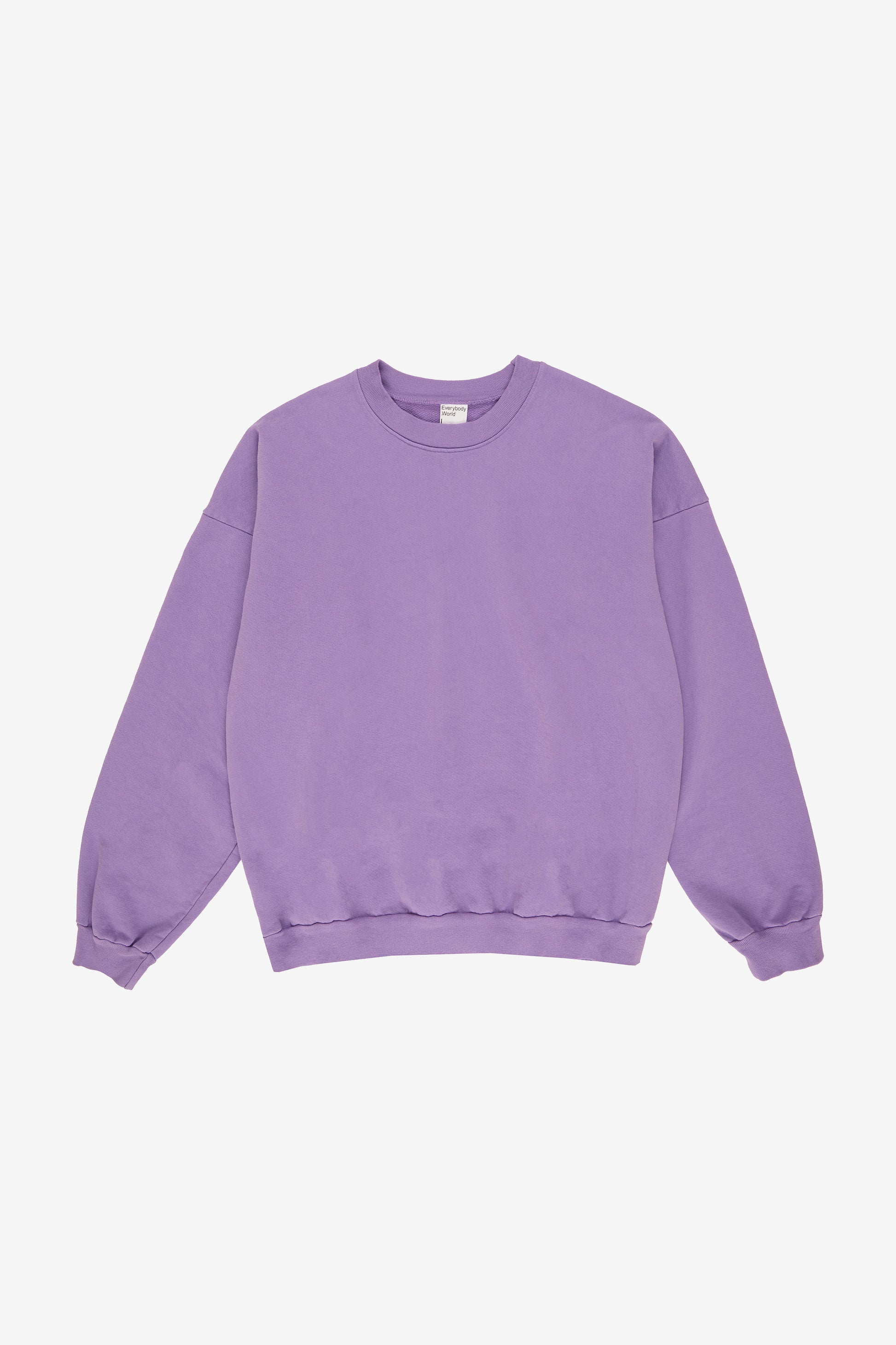 Flat lay: roomy body and sleeves with gathered fabric at rib knit cuffs and waistband.