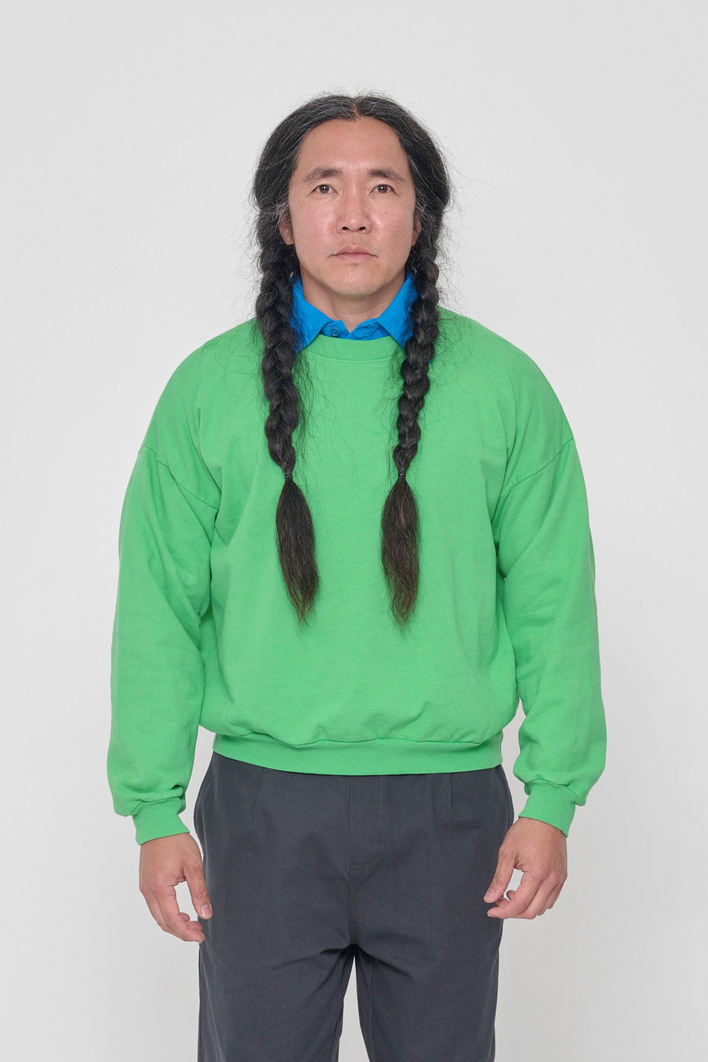 5'11" man in a size M Nice Grass Trash Crewneck. Hem sits at his hip bones. 