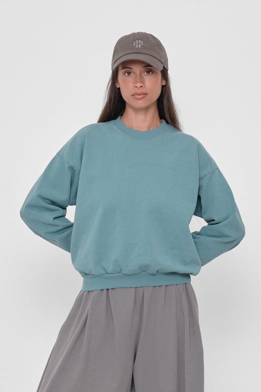 Trash Crewneck in Oyster – front view on model