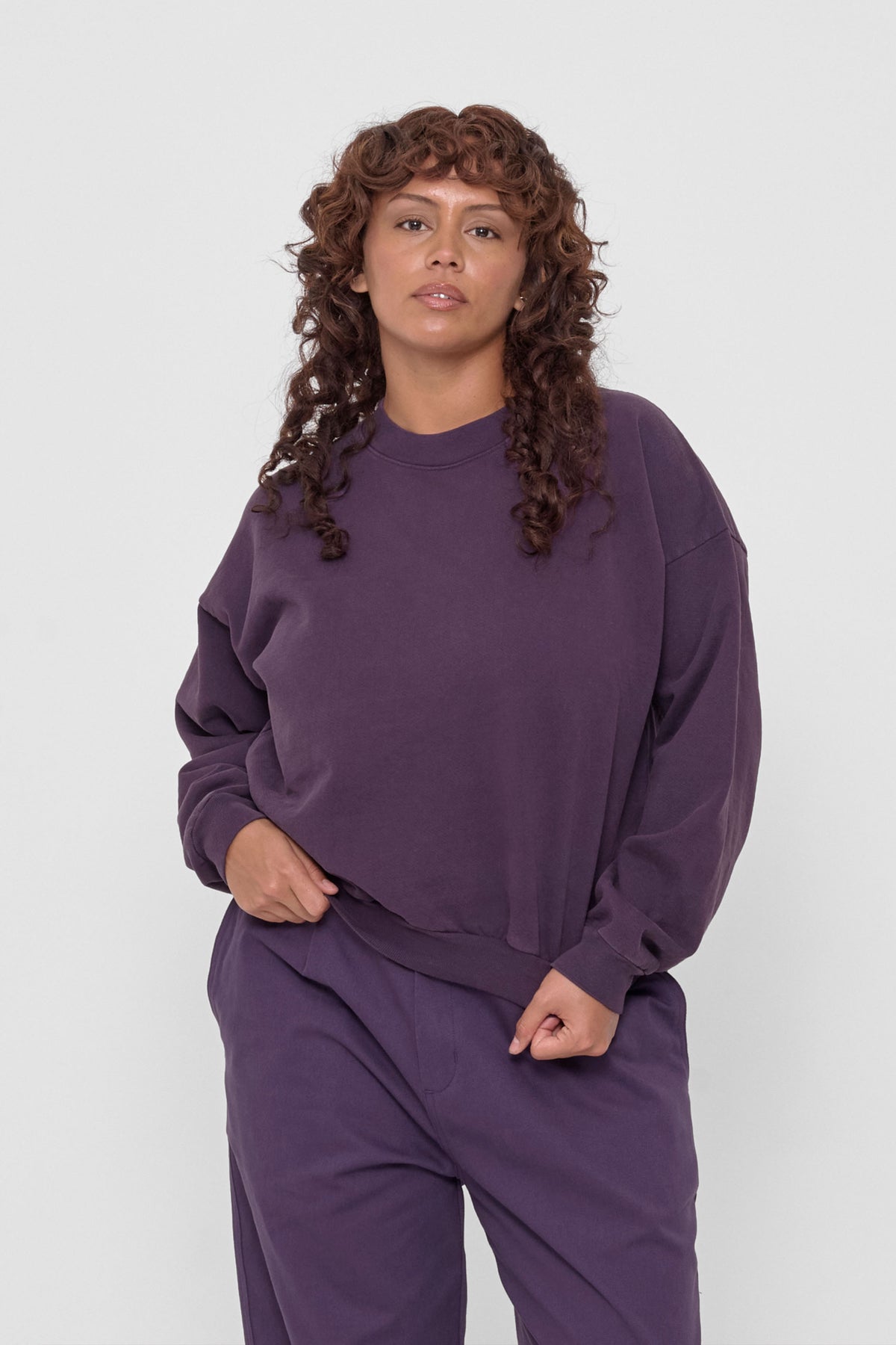 Trash Crewneck in Washed Mulberry – front view on model