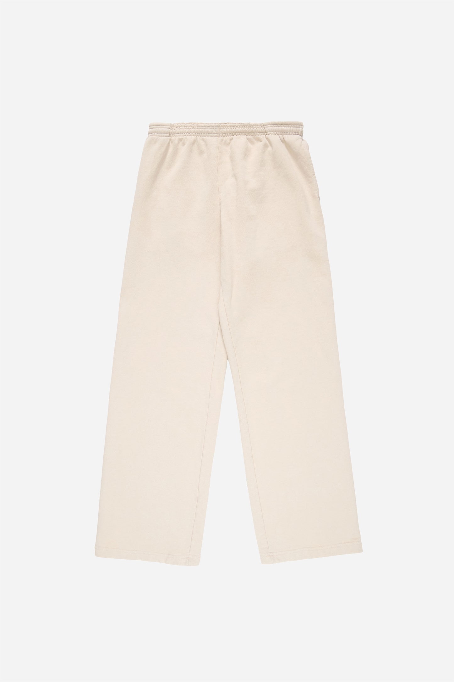 Flat lay of Trash Fleece Apartment Pants in Oat, showing the full length and straight leg of the relaxed-fit design.