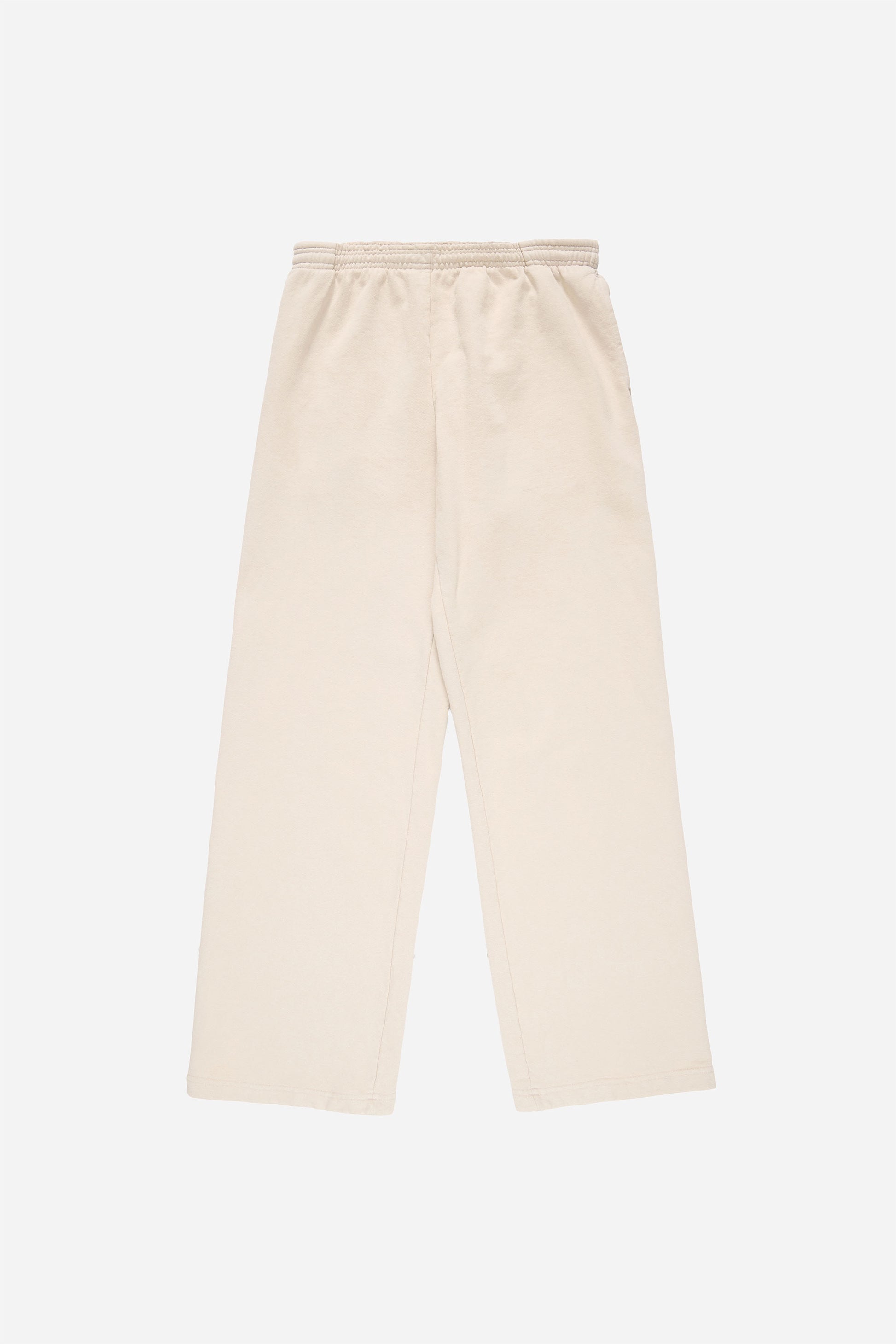 Flat lay of Trash Fleece Apartment Pants in Oat, showing the full length and straight leg of the relaxed-fit design.
