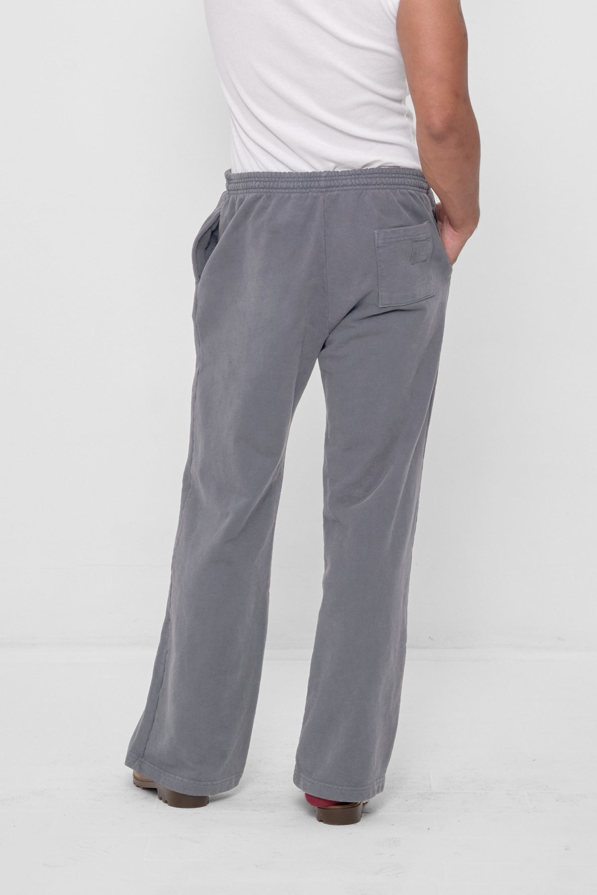Trash Fleece Apartment Pants in Stone – back view on model