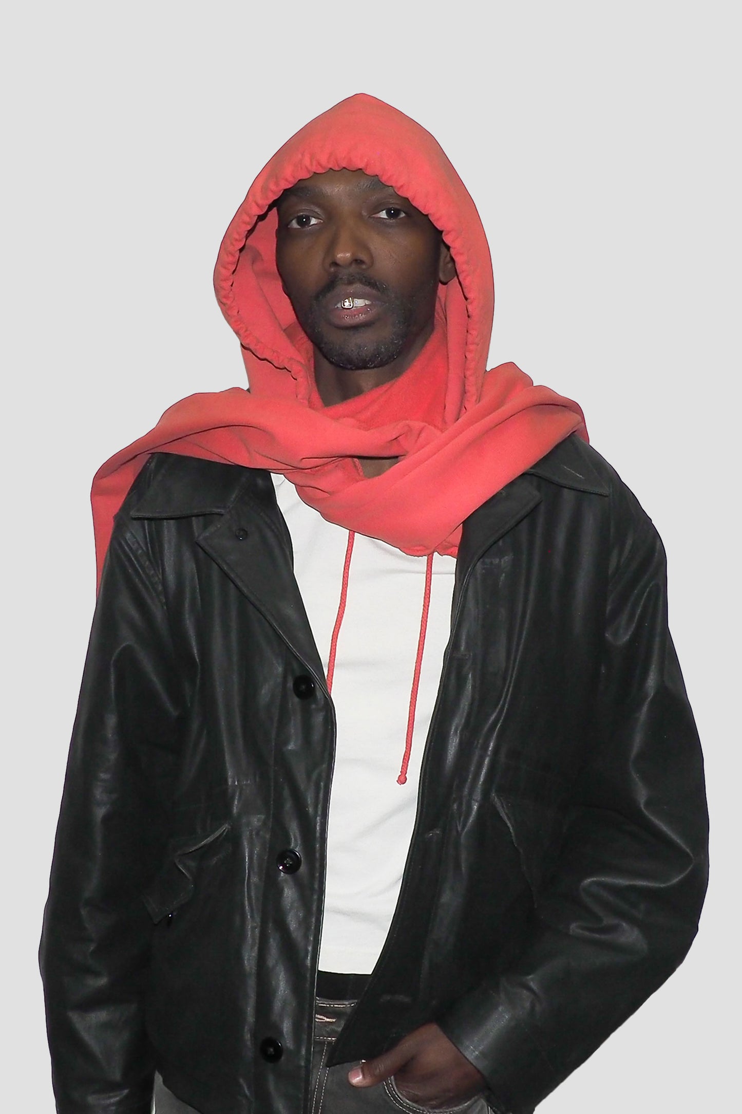 Cedar Clyde x Everybody.World Hoodie Scarf with arms swept behind model.
