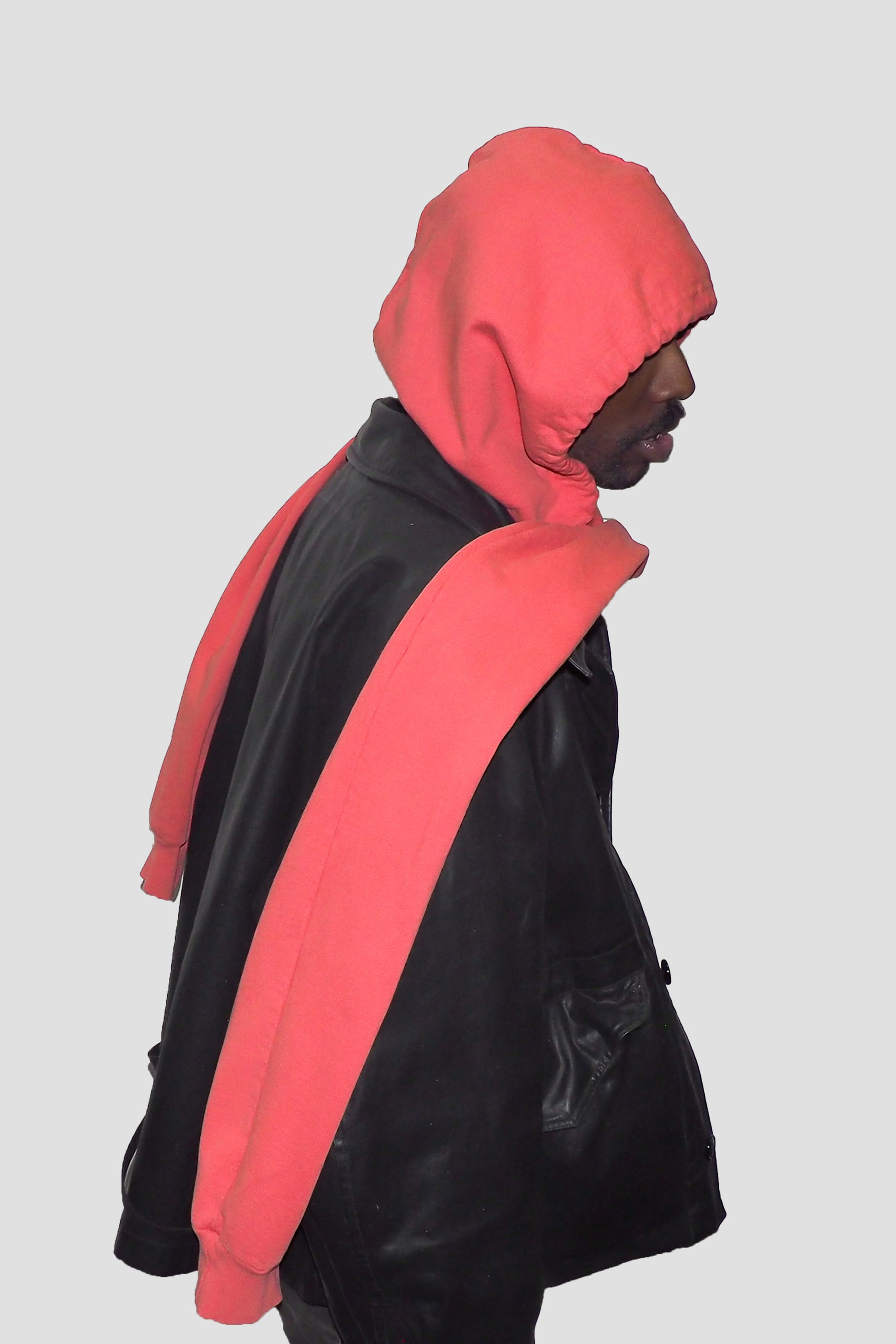 Side view of Cedar Clyde x Everybody.World Hoodie Scarf on model.