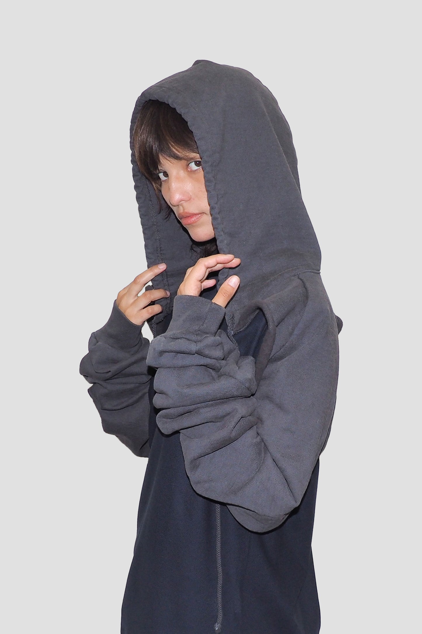 Profile view with hood on