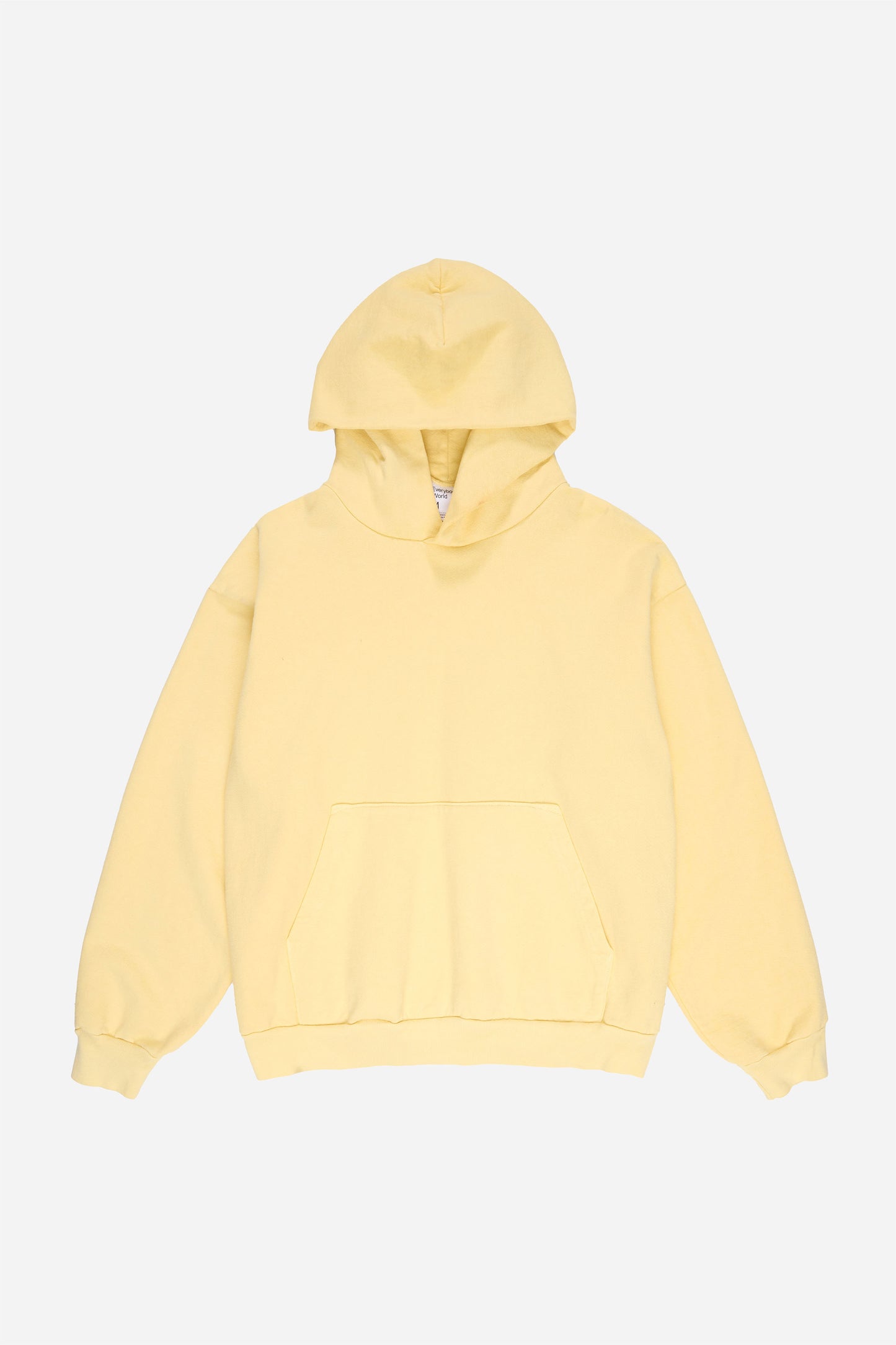 Flat lay front view of French Butter Trash Hoodie with hood lifted above the collar.