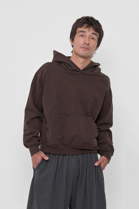 Trash Hoodie in Wet Soil – front view on model