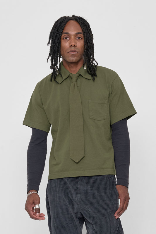 Trash Polo in Olive - front view on model