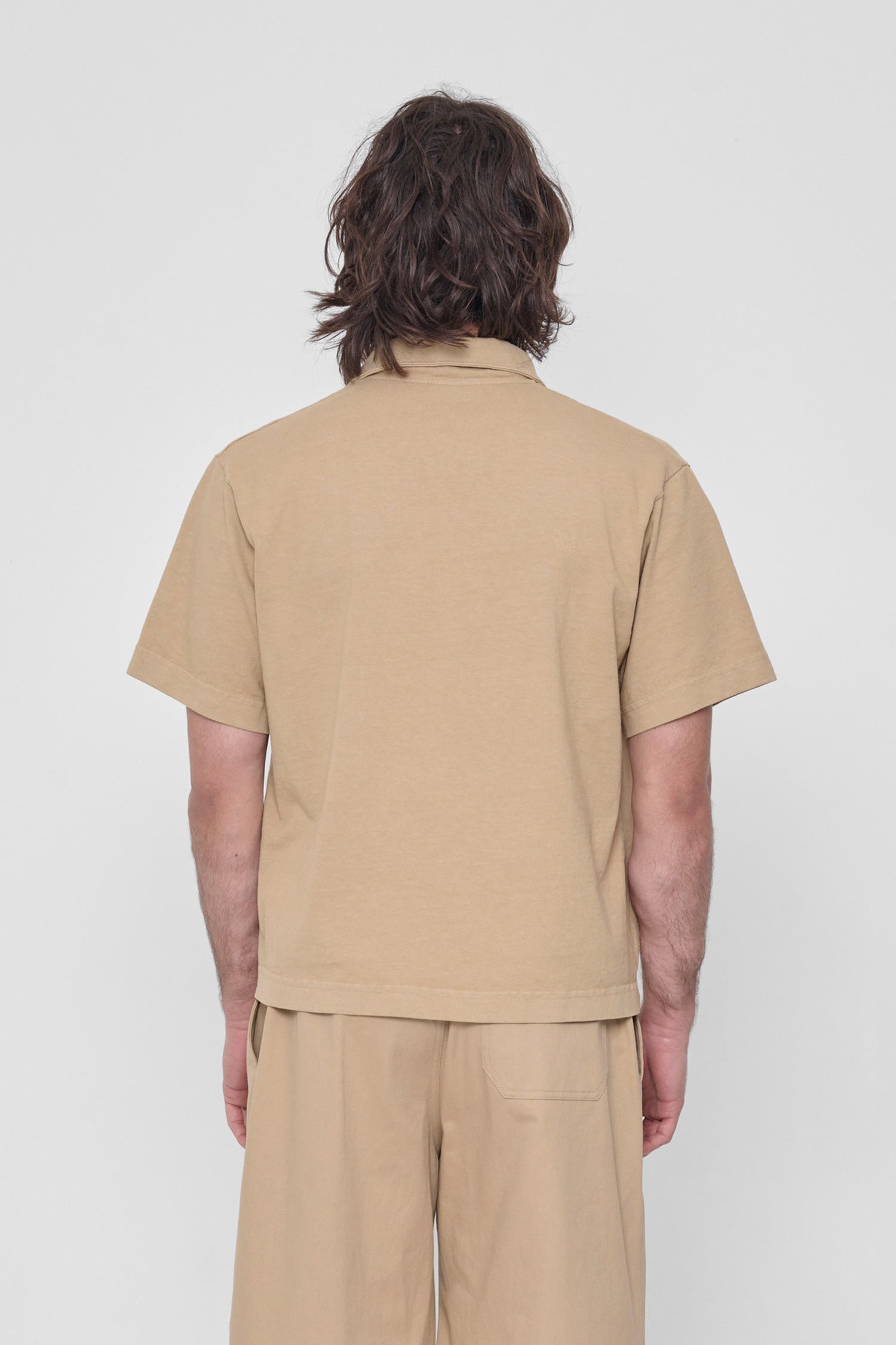 Back view: Roomy fit throughout and structured sleeves.