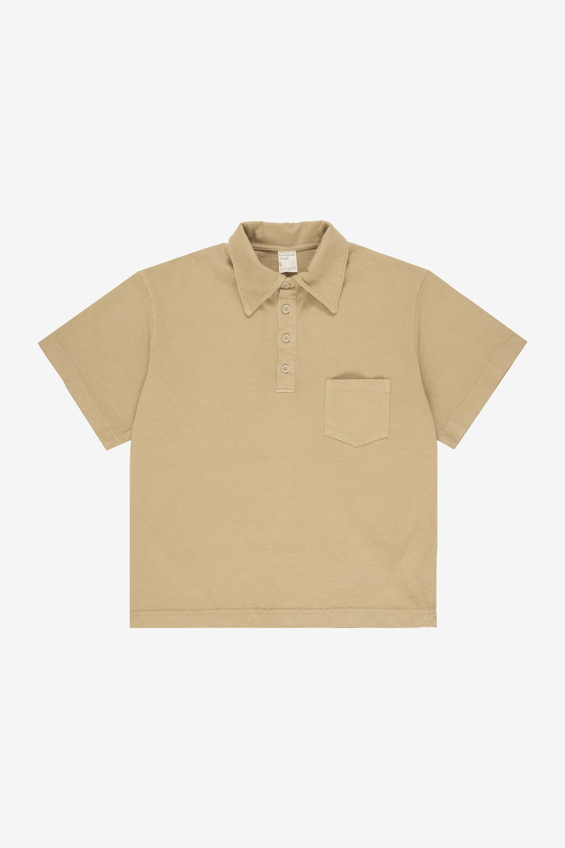 Flat lay showing the straight boxy cut of the body.