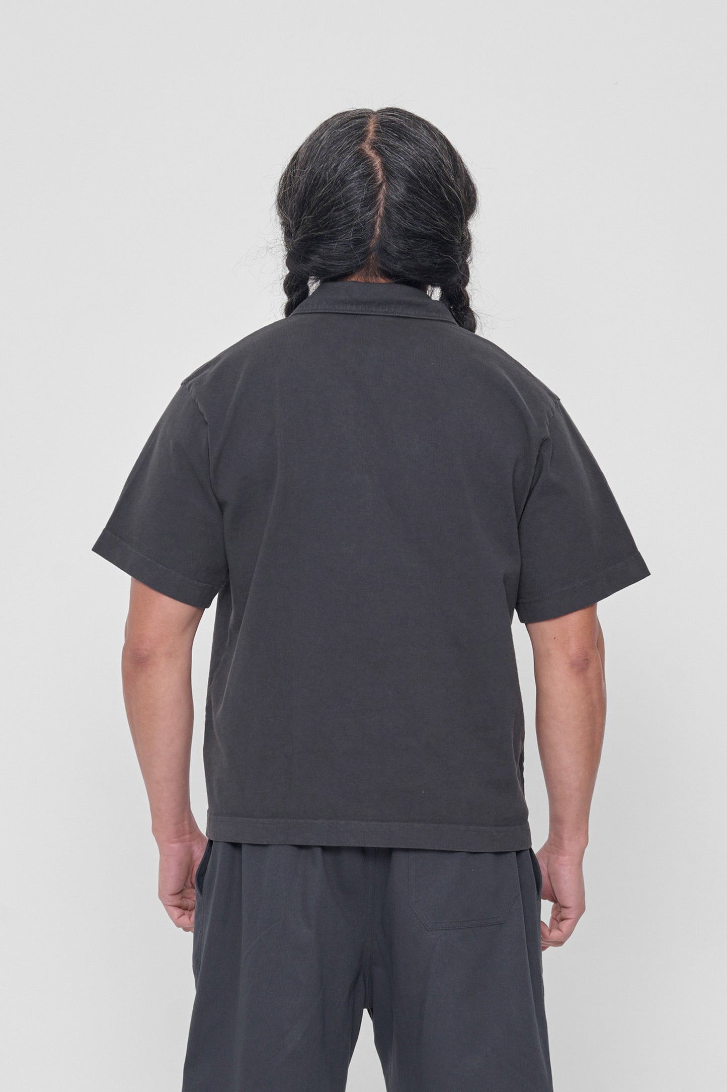 Back view: Roomy fit throughout and structured sleeves.