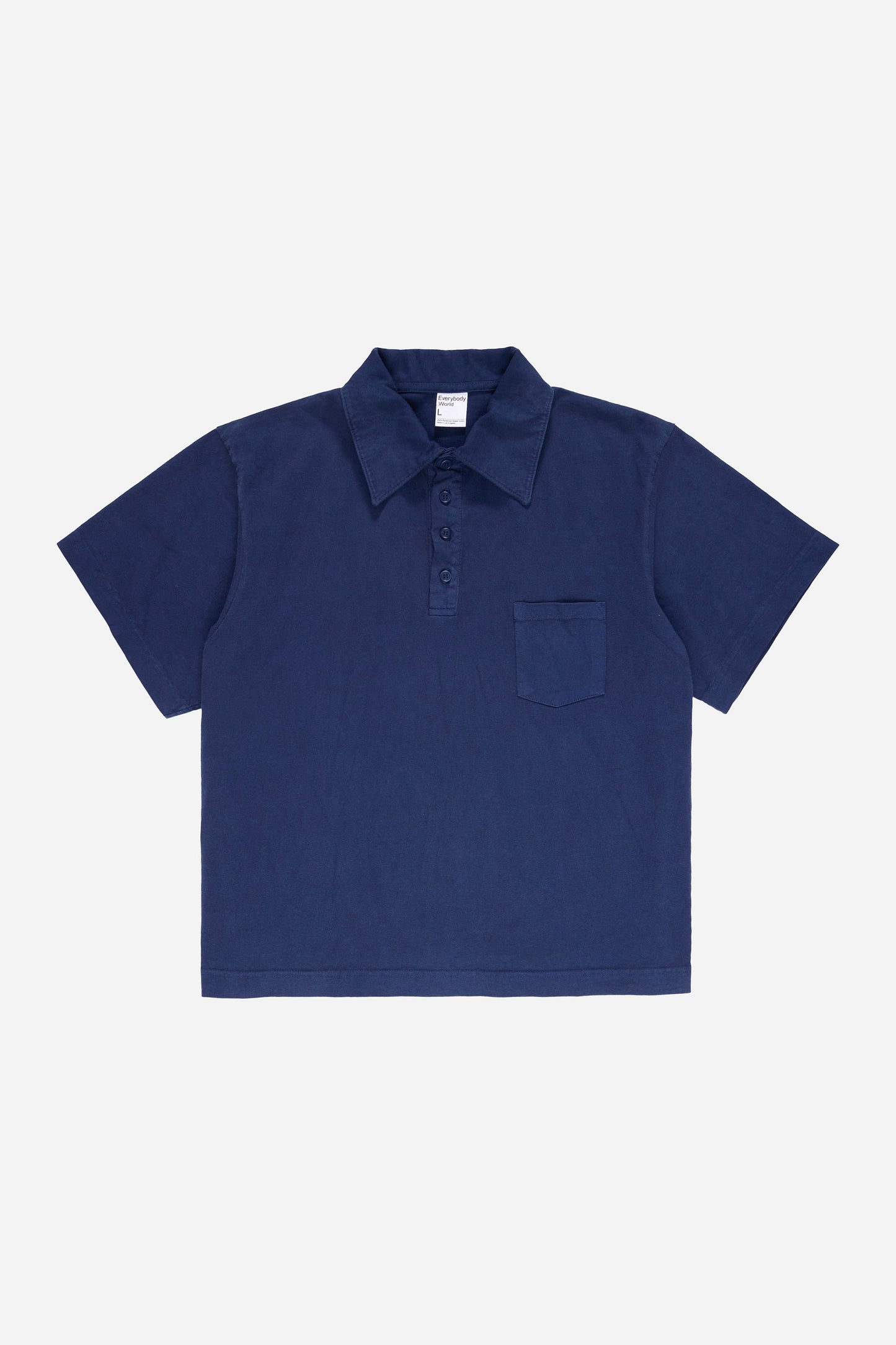 Flat lay front view of Washed Navy Trash Polo, showing collar, button placket and front chest pocket