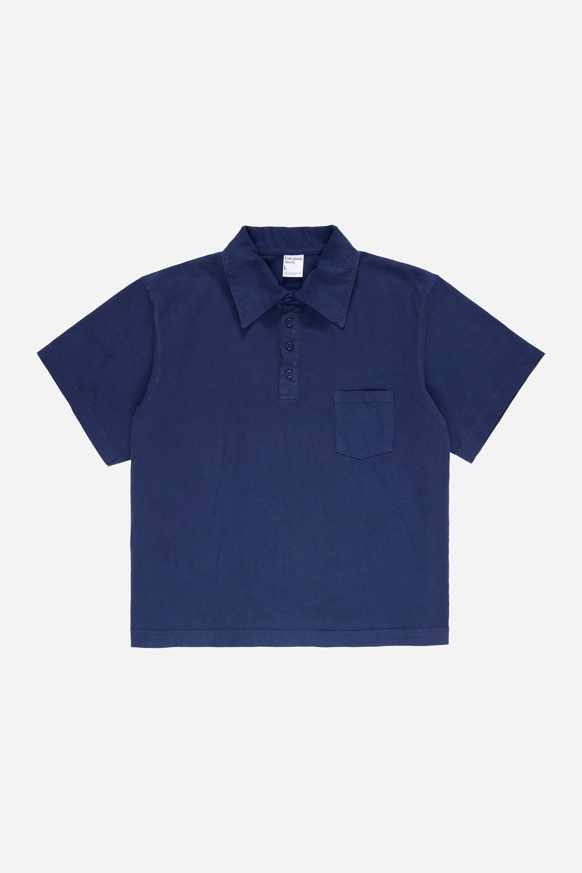 Flat lay front view of Washed Navy Trash Polo, showing collar, button placket and front chest pocket