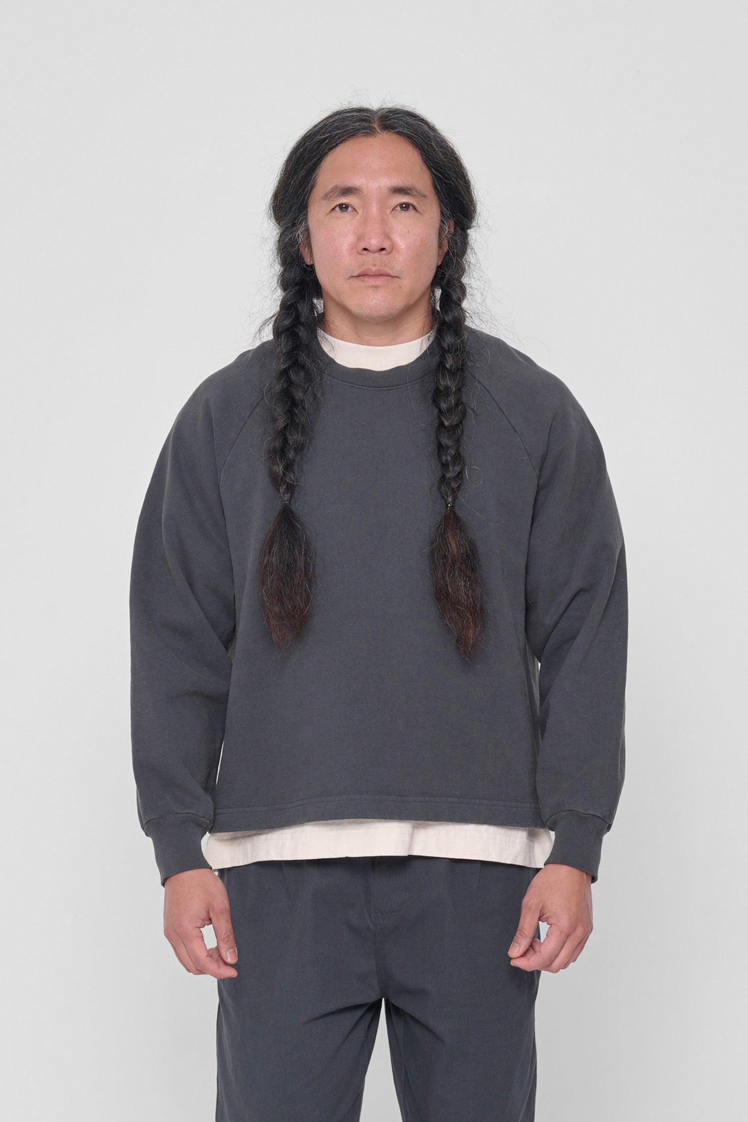 A 5'11" man wearing a Slate Trash Raglan in size M. Hem hits his upper middle hip.