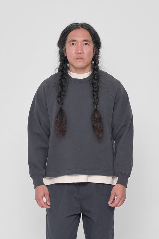 A 5'11" man wearing a Slate Trash Raglan in size M. Hem hits his upper middle hip.