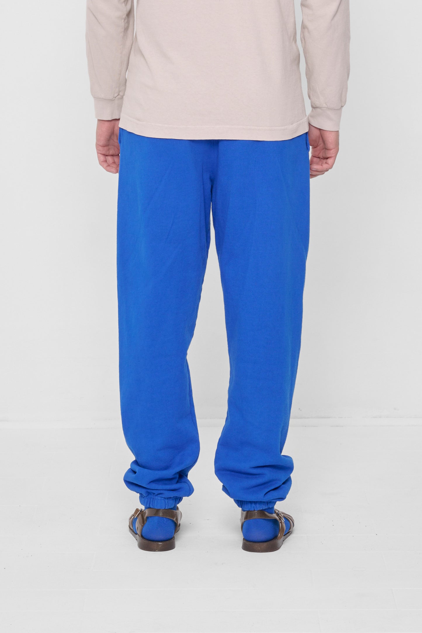 Back view: relaxed fit throughout, except for elastic waistband and cuffs.