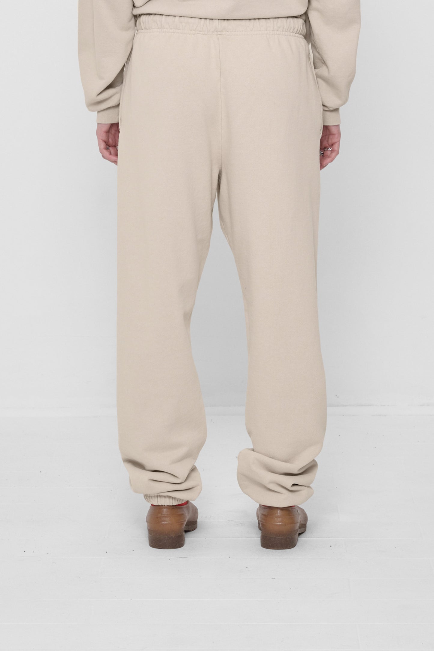 Back view: relaxed fit throughout, except for elastic waistband and cuffs.