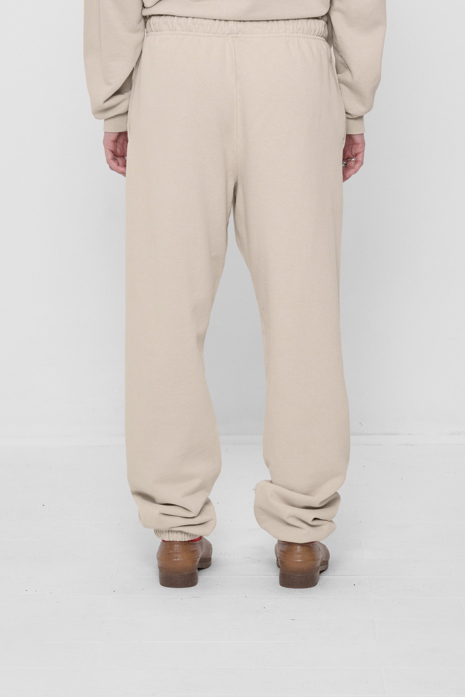 Back view: relaxed fit throughout, except for elastic waistband and cuffs.