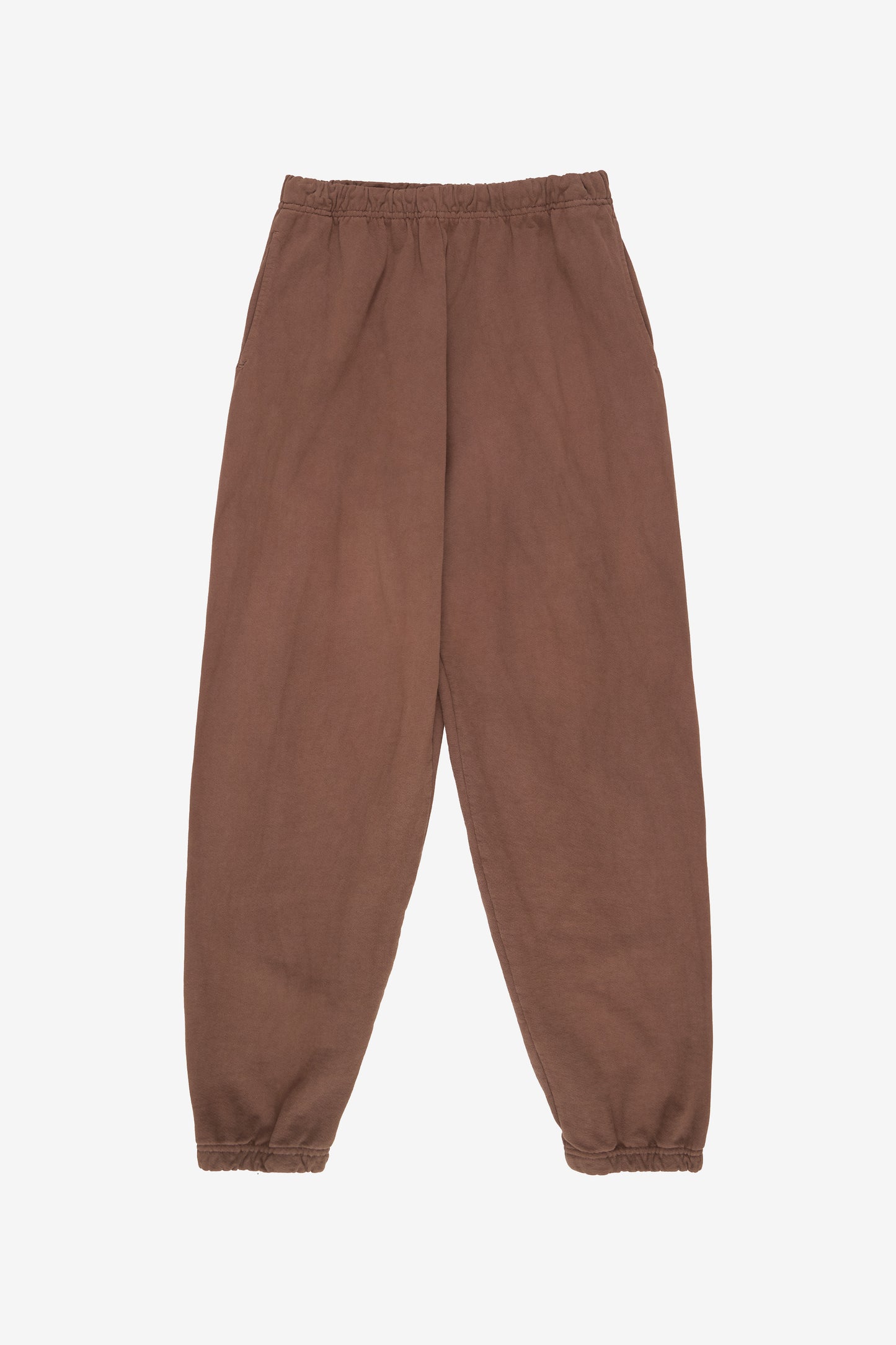 Flat lay shows straight leg with gathers at the elastic cuffs and waistband.