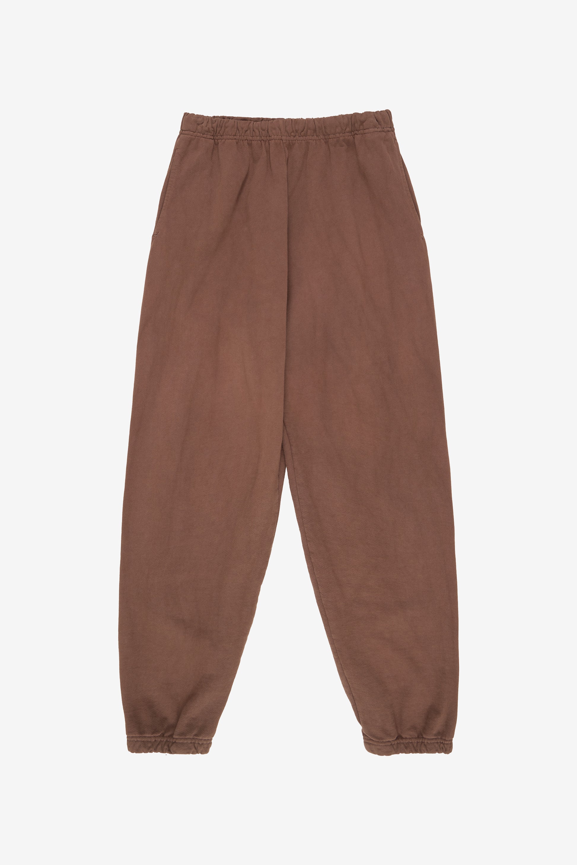 Flat lay shows straight leg with gathers at the elastic cuffs and waistband.