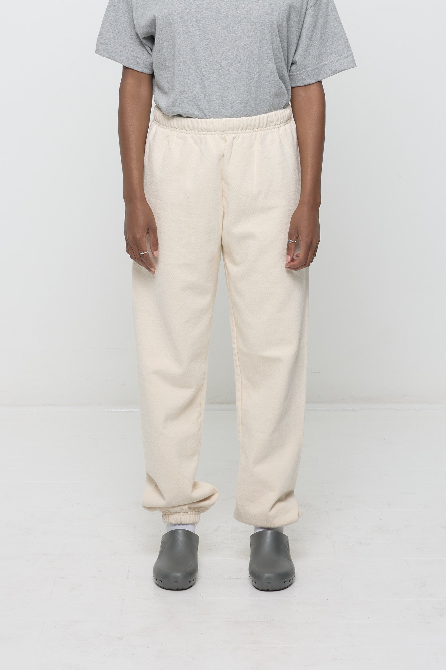 A 5'10" person in size XS Scour Trash Sweatpants. Slight bunching at the ankles.