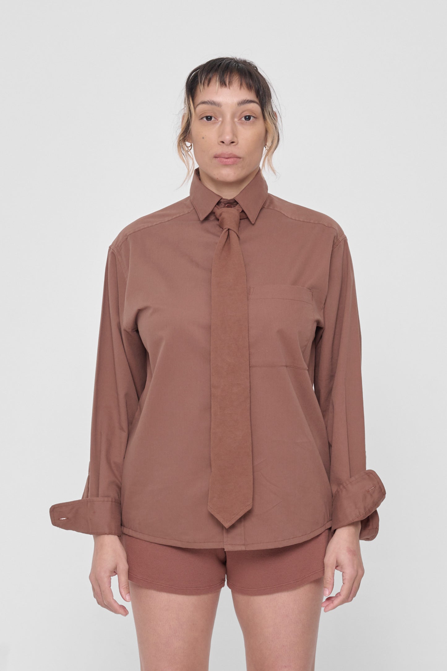 Person wearing Potting Soil Trash Tie  with Potting Soil Button-Up Shirt.