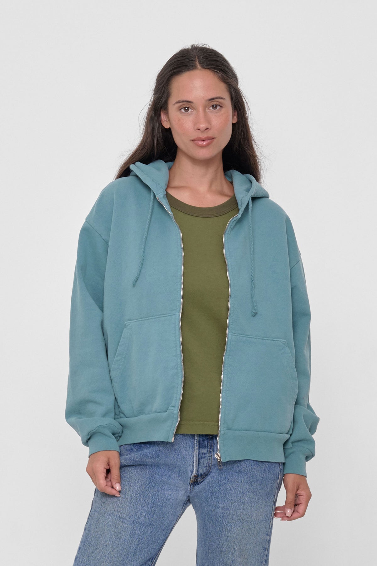 Trash Zip Up Hoodie in Oyster – front view on model, unzipped over Olive Ringer Trash Tee