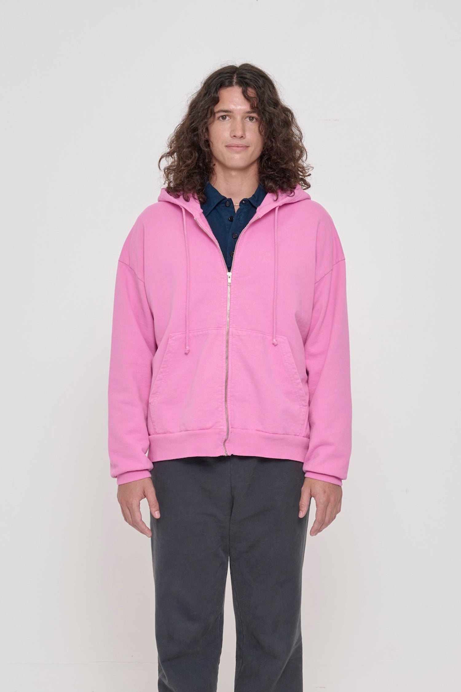 Front view of a person wearing Pixie Trash Zip Up Hoodie. Hem hits mid hip.