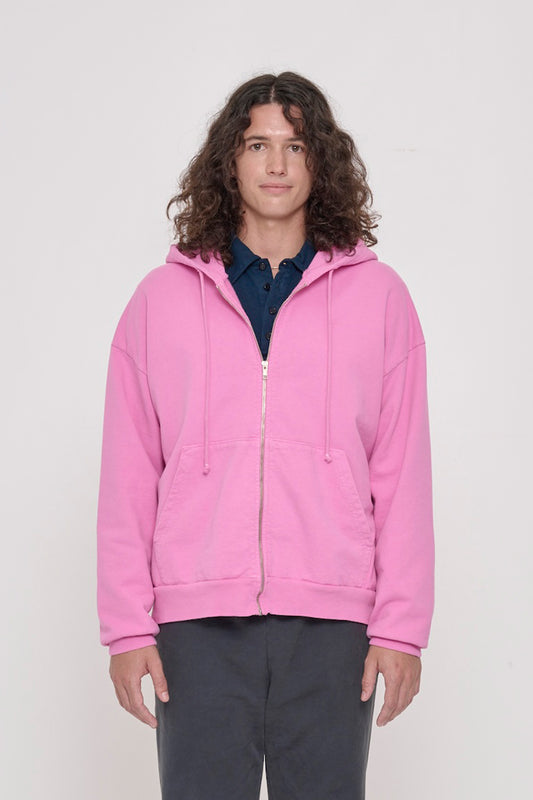 Front view of a person wearing Pixie Trash Zip Up Hoodie. Hem hits mid hip.