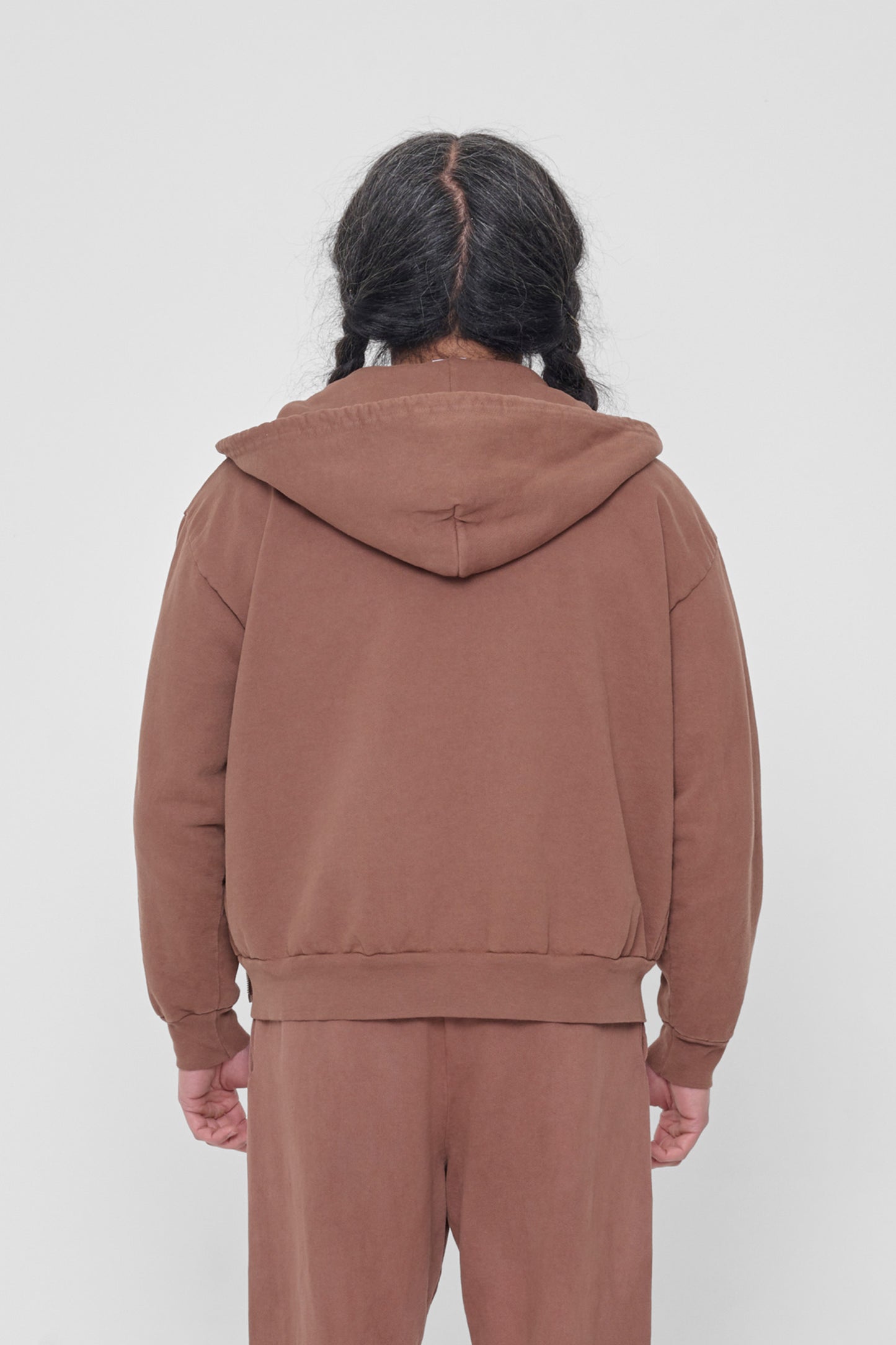 Back view highlighting the hood.