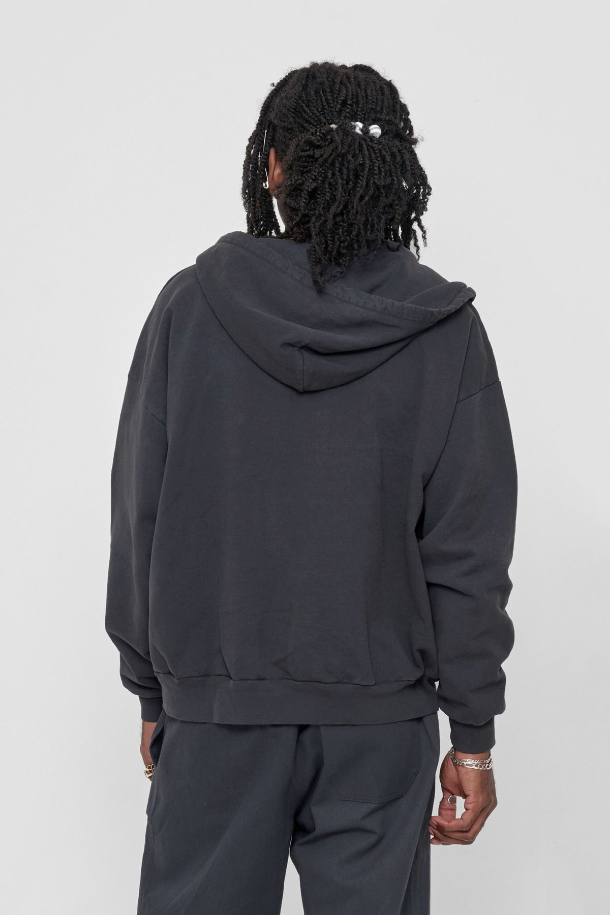 Trash Zip Up Hoodie in Slate – back view on model