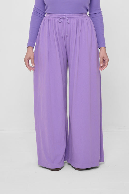 Waist down front view of Carpe Diem Tubular Pants on 5'4" model.