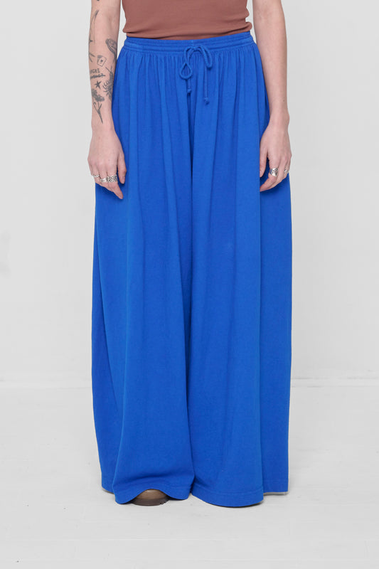 Waist down front view of Lapis Tubular Pants on 5'6" model.