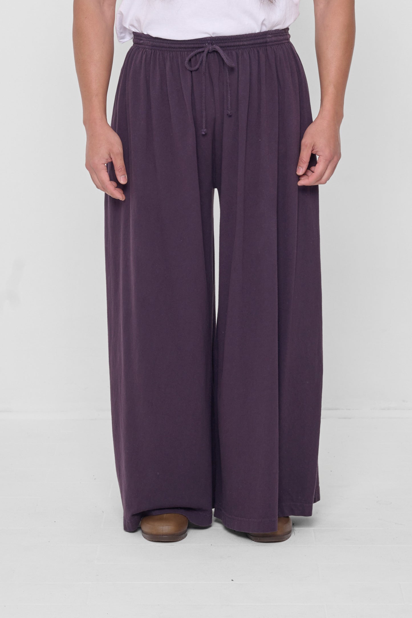 Waist down front view of Mulberry Tubular Pants on 5'11" model.