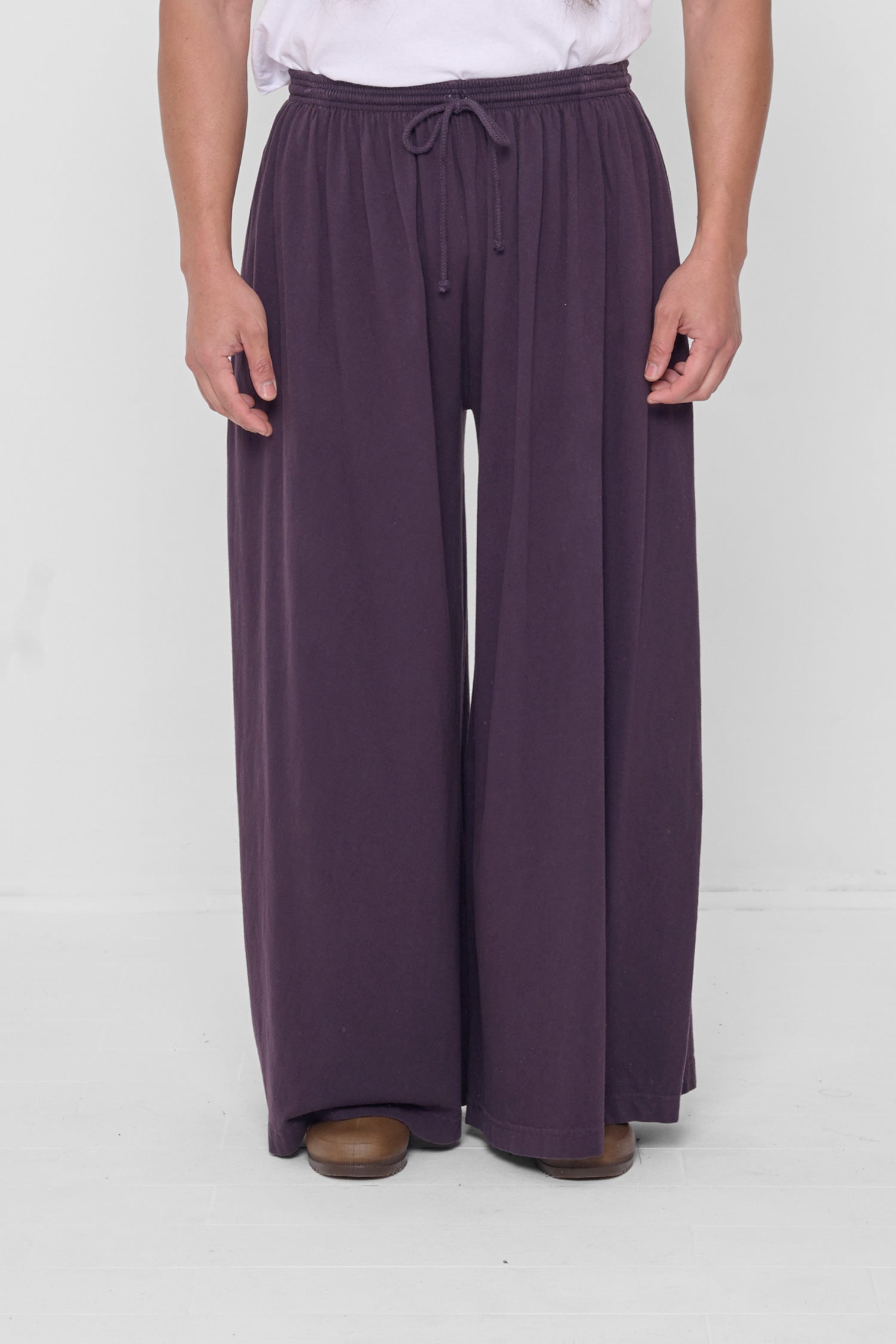 Waist down front view of Mulberry Tubular Pants on 5'11" model.