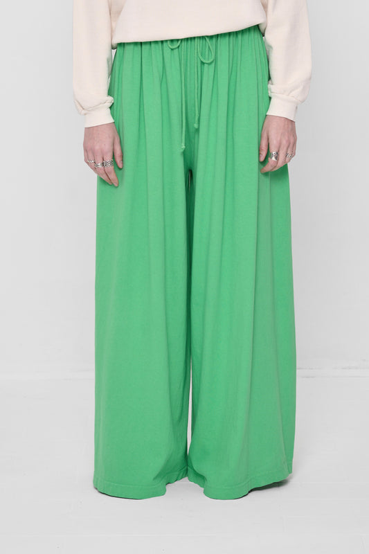 Waist down front view of Nice Grass Tubular Pants on 5'6" model.