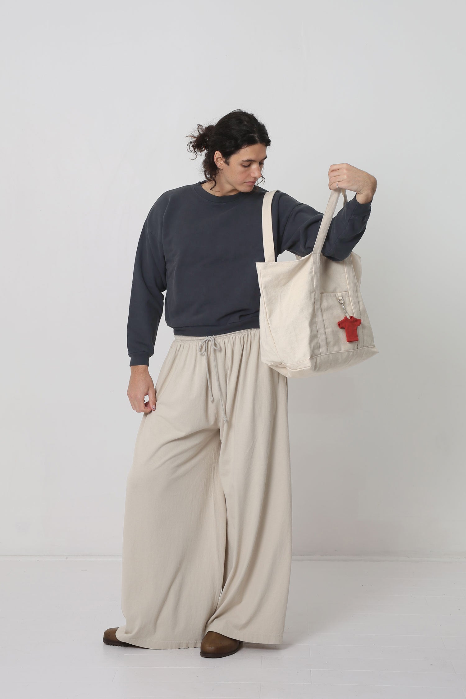 Styled with a Slate Trash Crewneck, an Overnight Tote and Plasticana Gardana Clogs