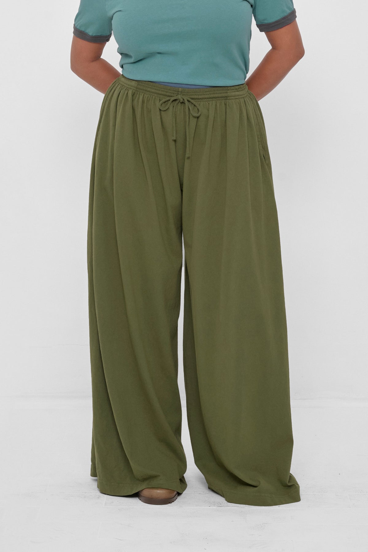 Tubular Pants in Olive – front view on model