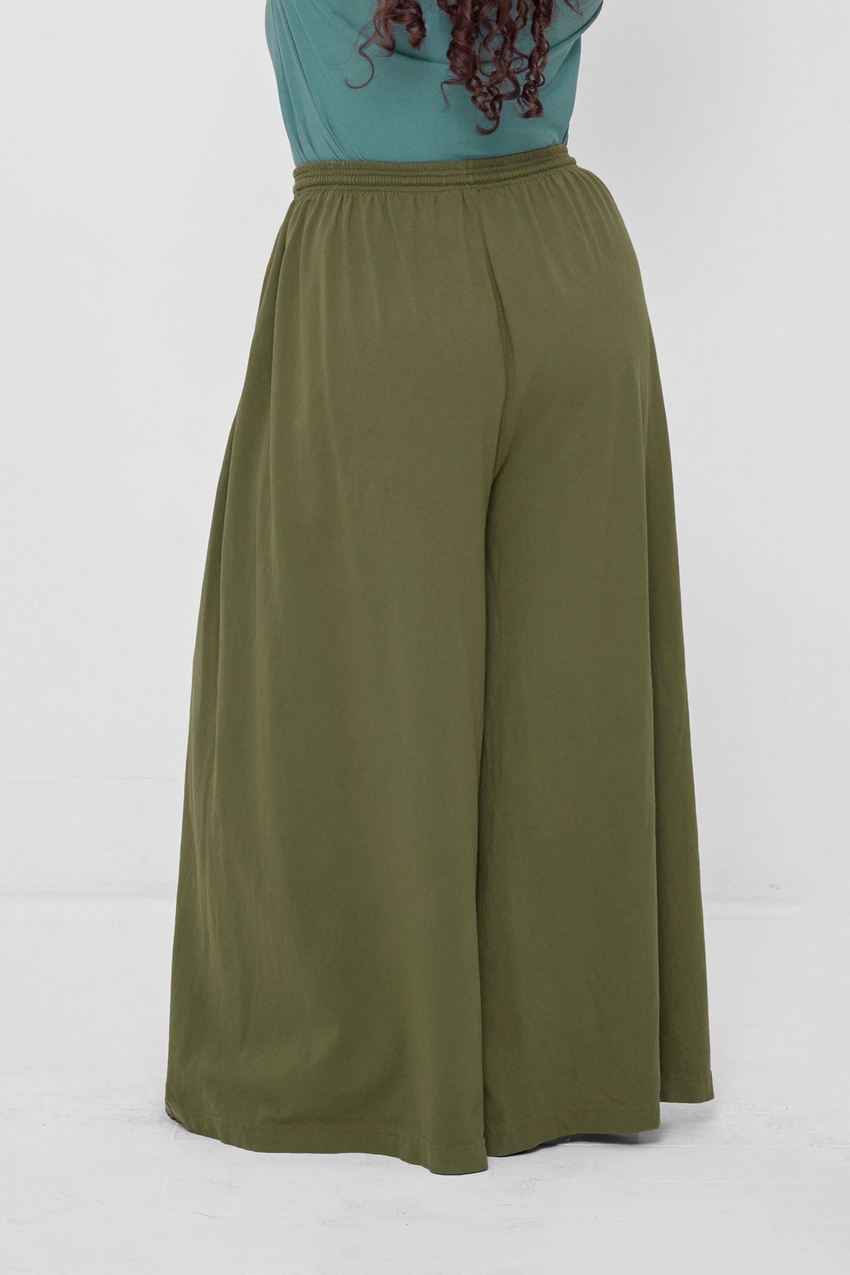 Tubular Pants in Olive – back view on model