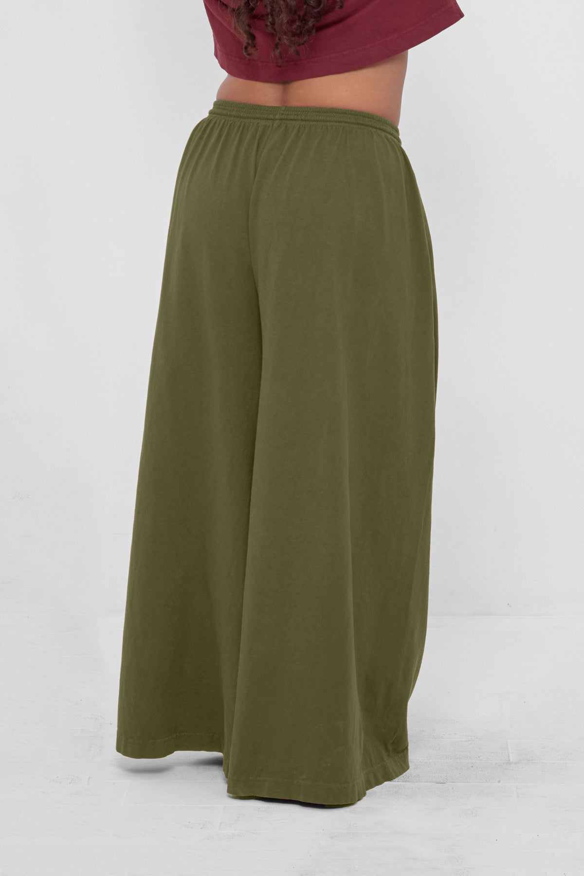 Tubular Pants in Olive – back view on model