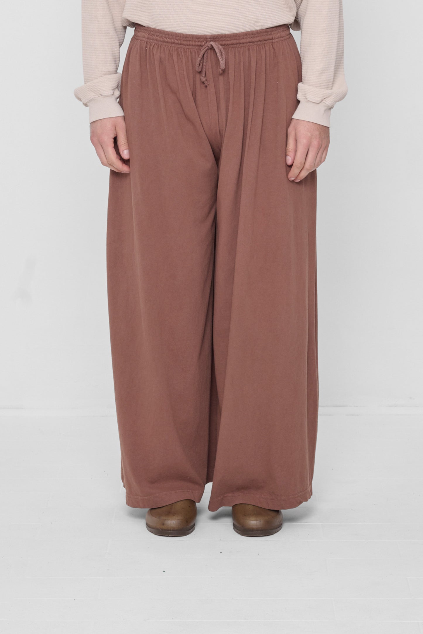 Waist down front view of Potting Soil Tubular Pants on 6'2" model.